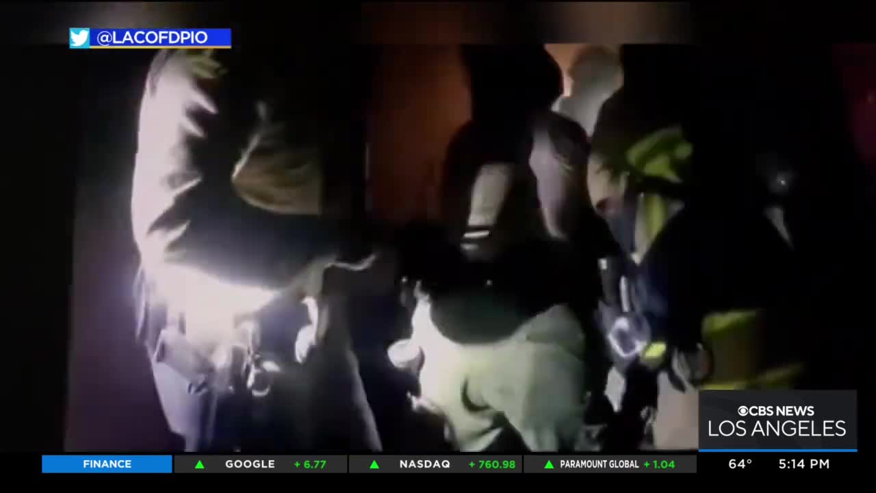 Dramatic video shows firefighters pulling man from burning home in Lancaster