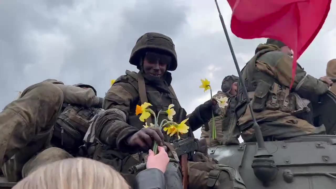 Russian army is welcomed with flowers in liberated area in Ukraine