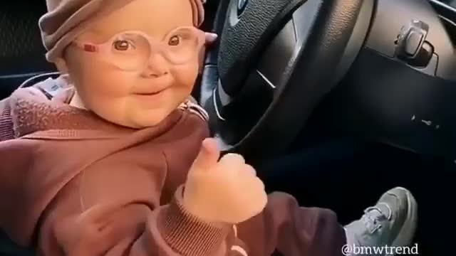 Kid dancing on BMW