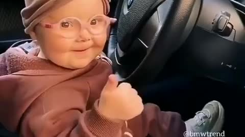 Kid dancing on BMW