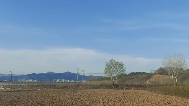 the clear spring sky of April