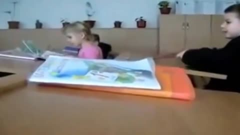 Kid Hits his head with a book