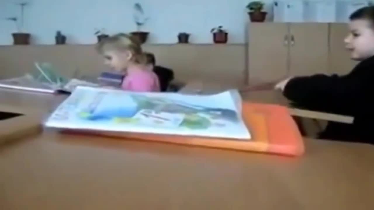 Kid Hits his head with a book