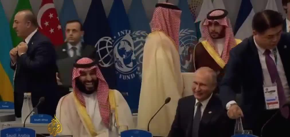 Putin and Saudi prince share a high five at G20 summit