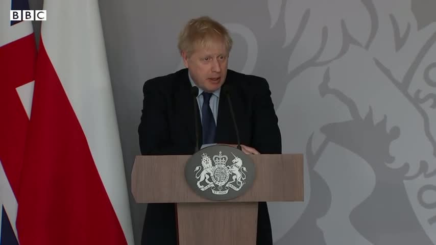 UK PM Boris Johnson confronted by tearful Ukrainian journalist - BBC News