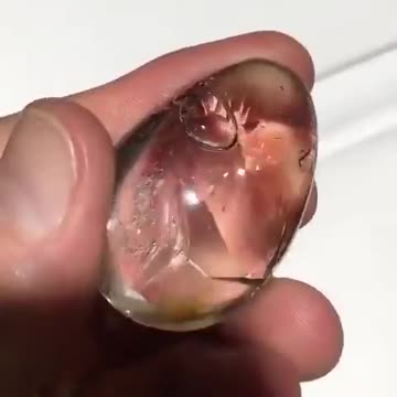 10,000-year-old water trapped inside a polished quartz crystal