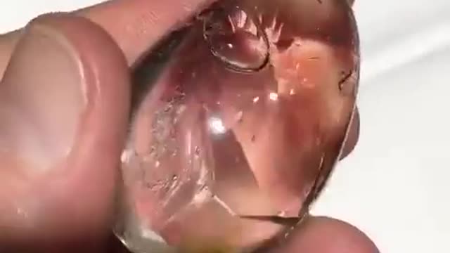 10,000-year-old water trapped inside a polished quartz crystal