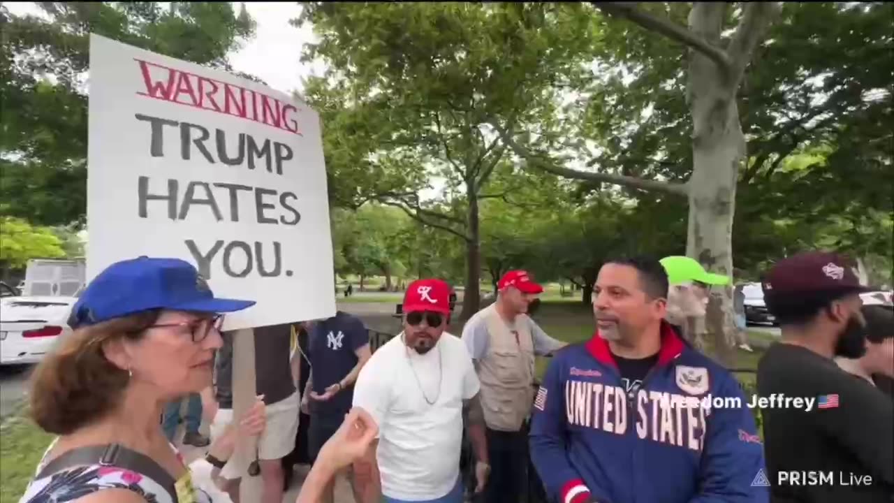 Watch: Woman with 'Trump is a Nazi' sign crashes ex-president's Bronx rally