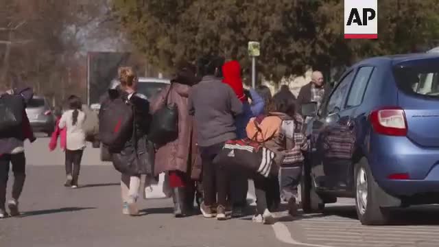 People fleeing Ukraine arrive by train in Hungary