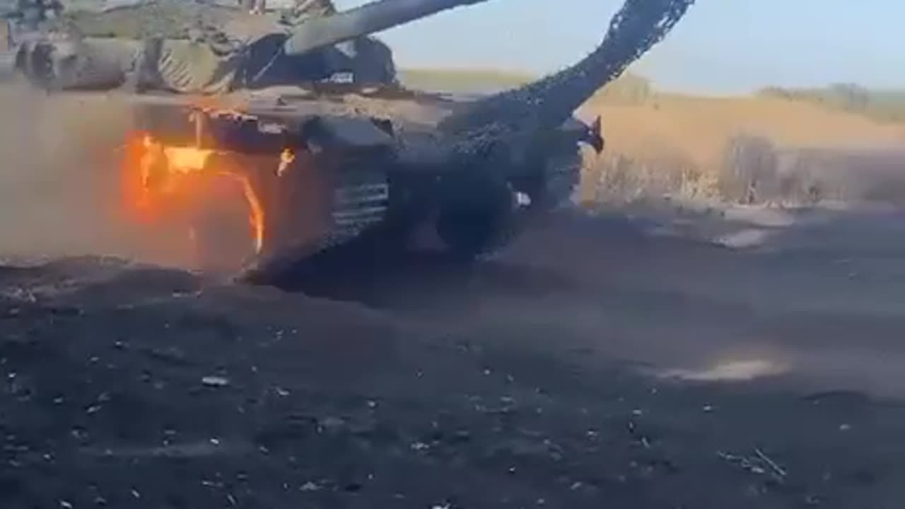 Russian burning T-90M returns to the rear after being hit by a Ukrainian FPV drone for repairs.