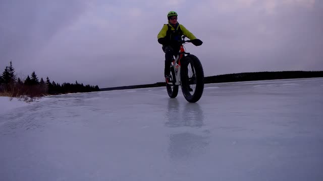 Fat bike ride on frozen lake