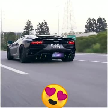 What a beautiful black Lamborghini in Car showroom or on road.