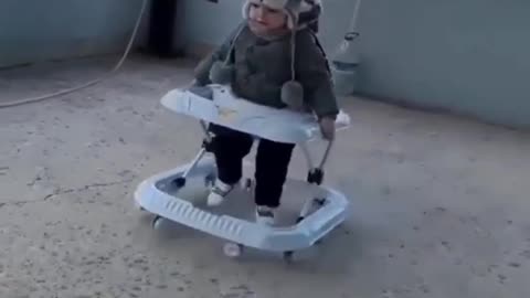 Cute baby playing with my car