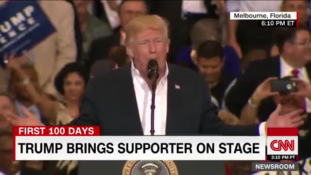 Trump brings supporter on stage during rally