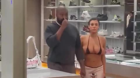 Why does Kanye West's girlfriend have to walk around like that?