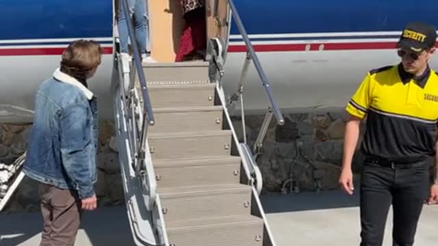 LOOK WHO GETS OFF THE PLANE