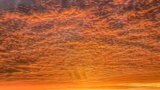 The glow, the rosy clouds all over the sky infinite beauty.