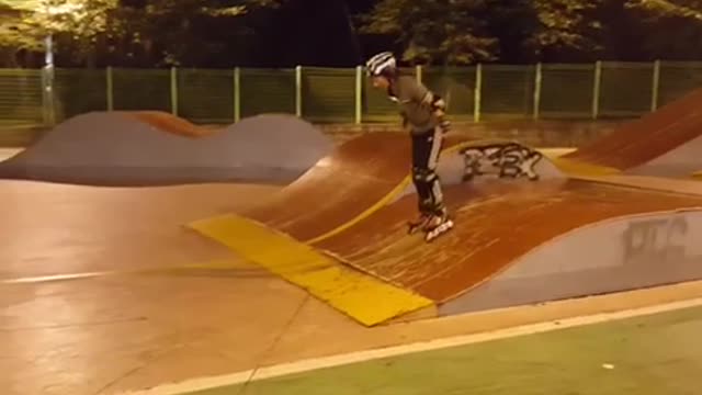Roller skates woman tries to go up skate park ramp and hits back head