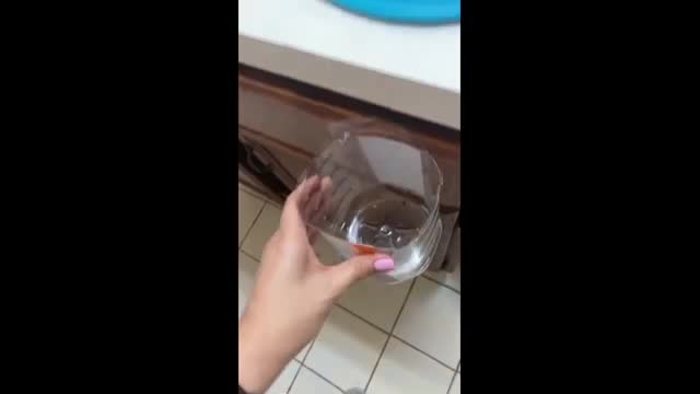 Woman displays her parent's unique kitchen life hack