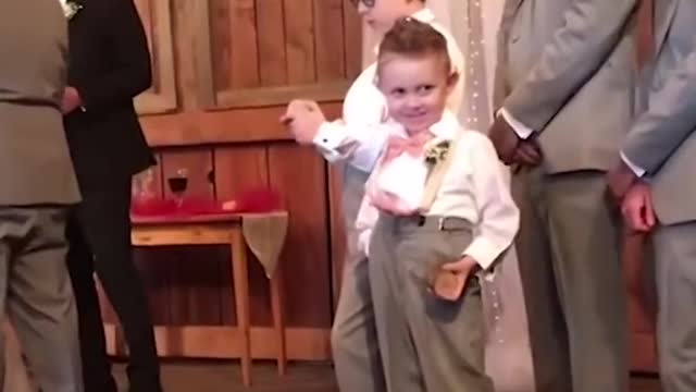 Check out these kids adding some comedy to these weddings