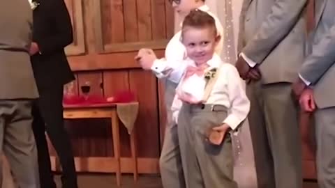 Check out these kids adding some comedy to these weddings