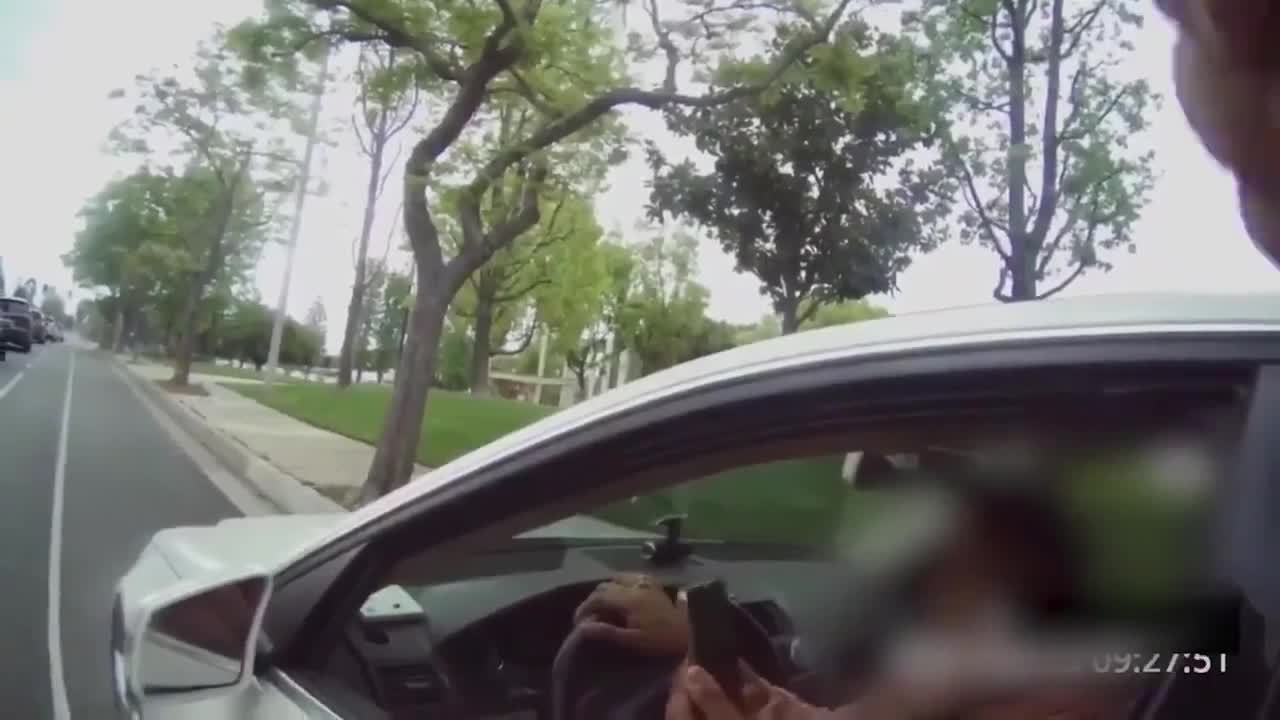 Woman Berates Cop During Traffic Stop Calling Him "Murderer" And "Mexican Racist"