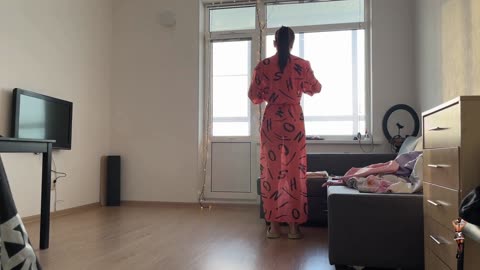 Kira #7: Folding Washed Clothes (in Red Dress) 