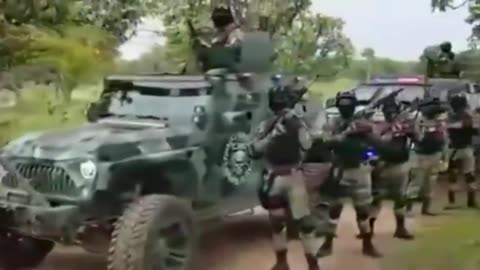 This looks like a video of the Mexican police or military. It's video of one of the drug cartels