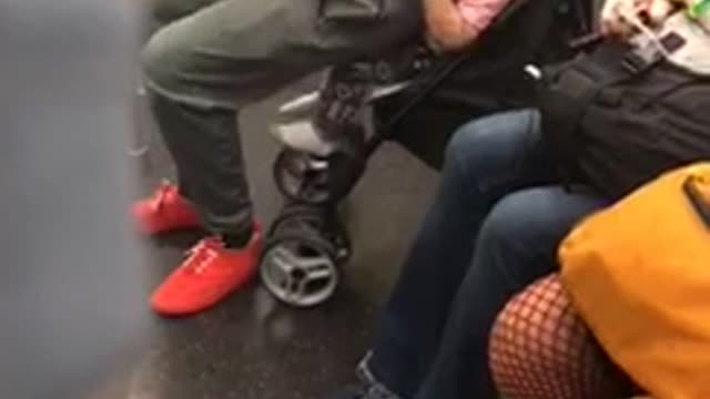 Red shirt sweats lady twerking dancing on baby in stroller