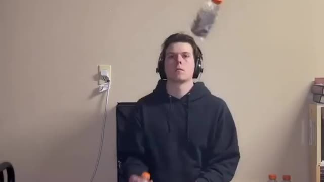Talent by throwing a bottle at this young man