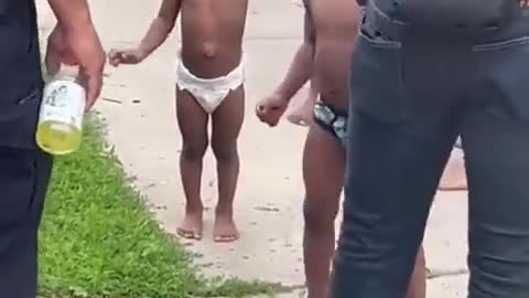 Shocking moment TODDLER swings at Minnesota cops and tells them to ‘f*** off’