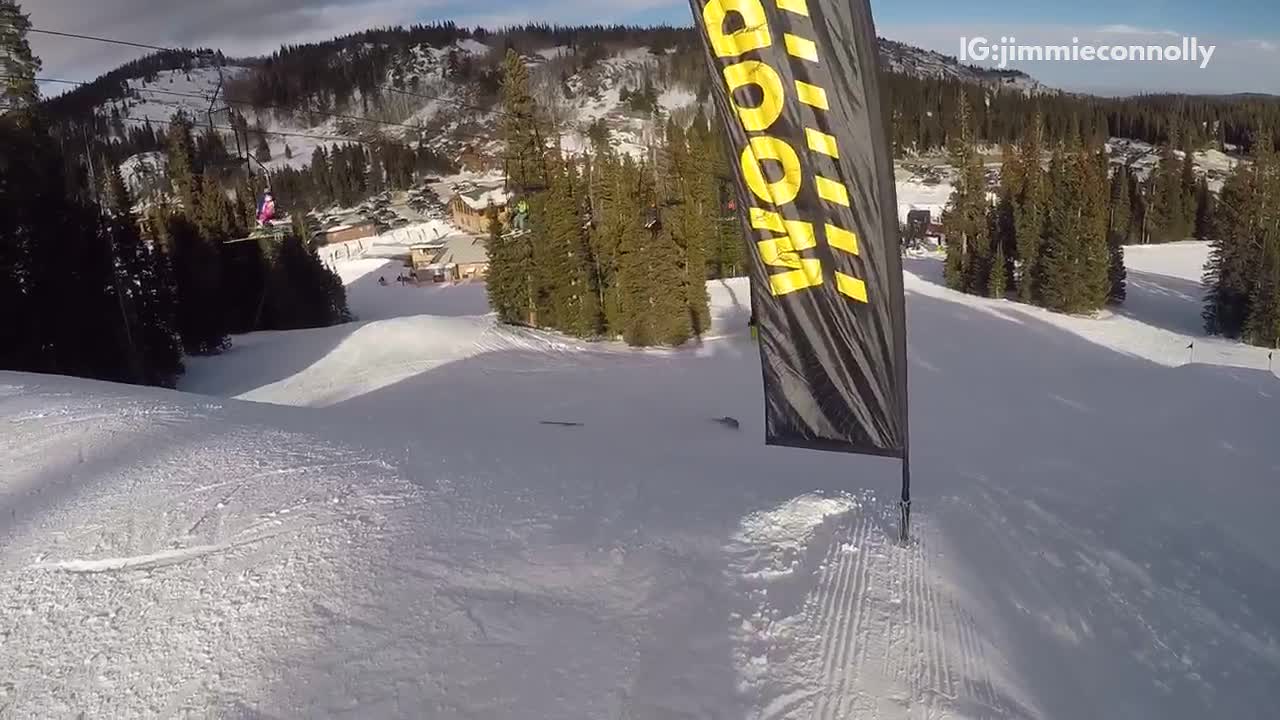 Orange pants green jacket ski jump fail lands on back