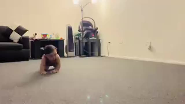 Baby boy crawling for the first time