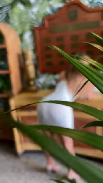 Seeing me thru the leaves… #highheels #stockings #minidress #shortdress #clubdress