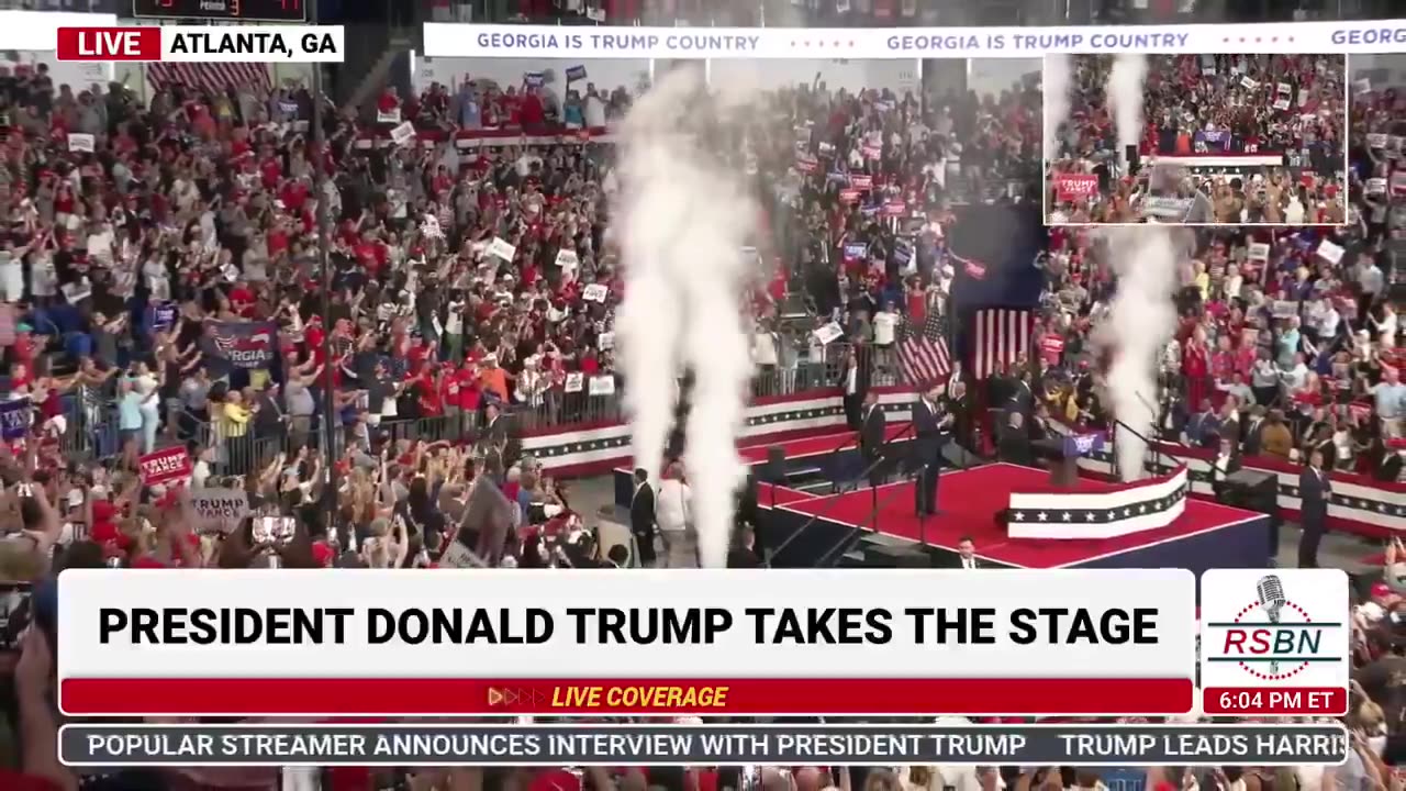 TRUMP TAKES THE STAGE AT ATLANTA RALLY.