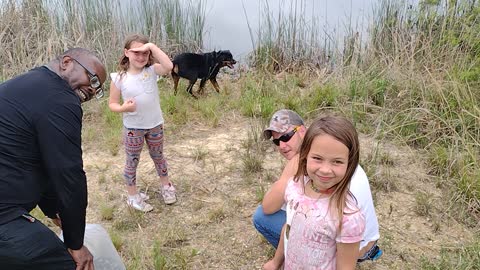 Putting Fish in the pond with the grandkids