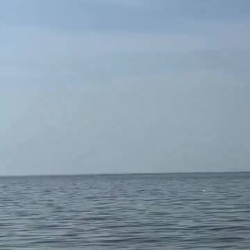 🇷🇺 🇺🇦 Russian cruise missiles flying past fisherman on the way to hitting Ukrainian targets.