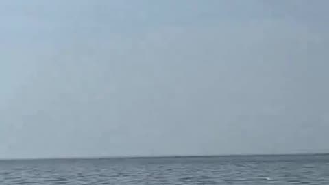 🇷🇺 🇺🇦 Russian cruise missiles flying past fisherman on the way to hitting Ukrainian targets.