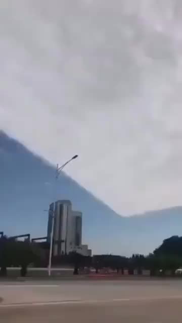 Mysterious Rectangular Cloud Formation: Natural Phenomenon or Human Intervention?