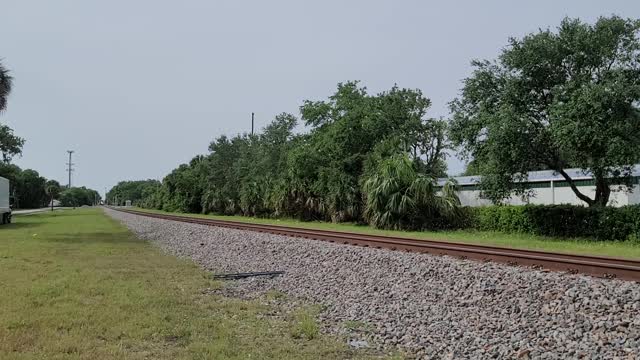 Beautiful FEC NB intermodal train through New Smyrna Beach