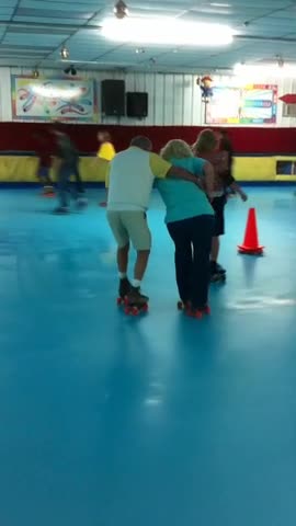 Senior Woman Takes A Tumble At The Roller Rink