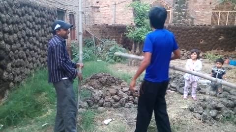 Two boys showing their acting talent in front of camera