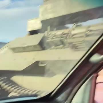 A local women driving around the city burning Russian armored vehicles with Molotov Сocktails.