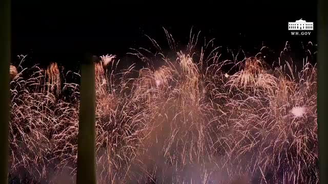 The Bidens watch inauguration fireworks display from WH balcony