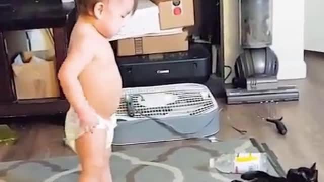 Small baby funny moment with black cute cat