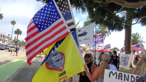 Long Line of Protesters: "No Mask Mandates, No Vaccine Mandates"