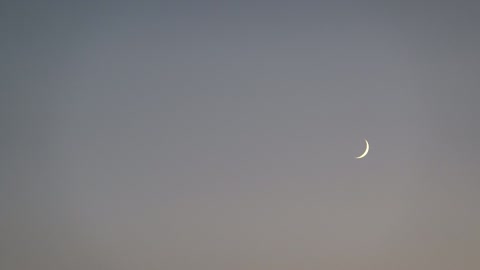 the crescent moon before sunset