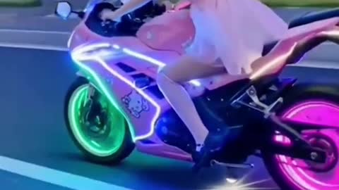 Barbie girl riding a SUPER BIKE