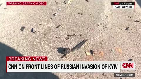 CNN reporter discovers he is crouching by grenade while on air