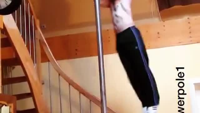 Muscle man pole dancing